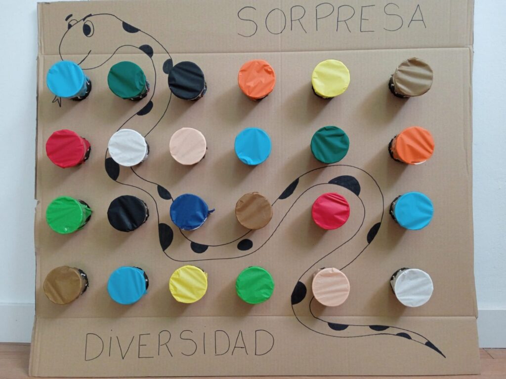 Sorpresa Diversidad Juego de serpiente con premios